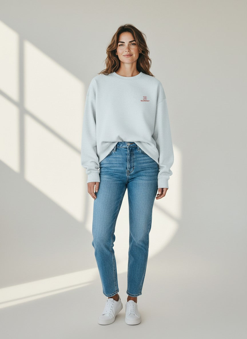 BeachBodyz® light blue oversized sweatshirt made from organic cotton with a small red embroidered logo on the chest.