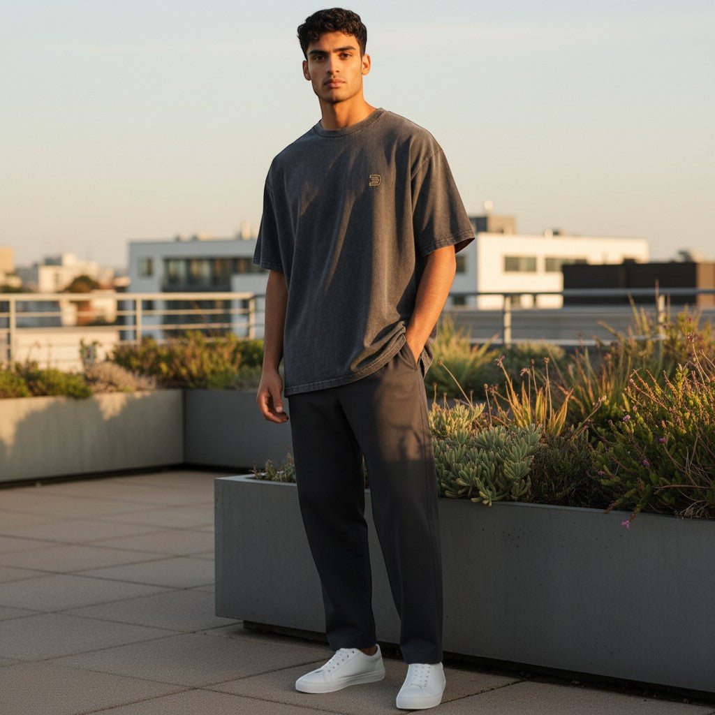 BeachBodyz® dark grey oversized cotton t-shirt with subtle gold logo on chest. Washed effect.