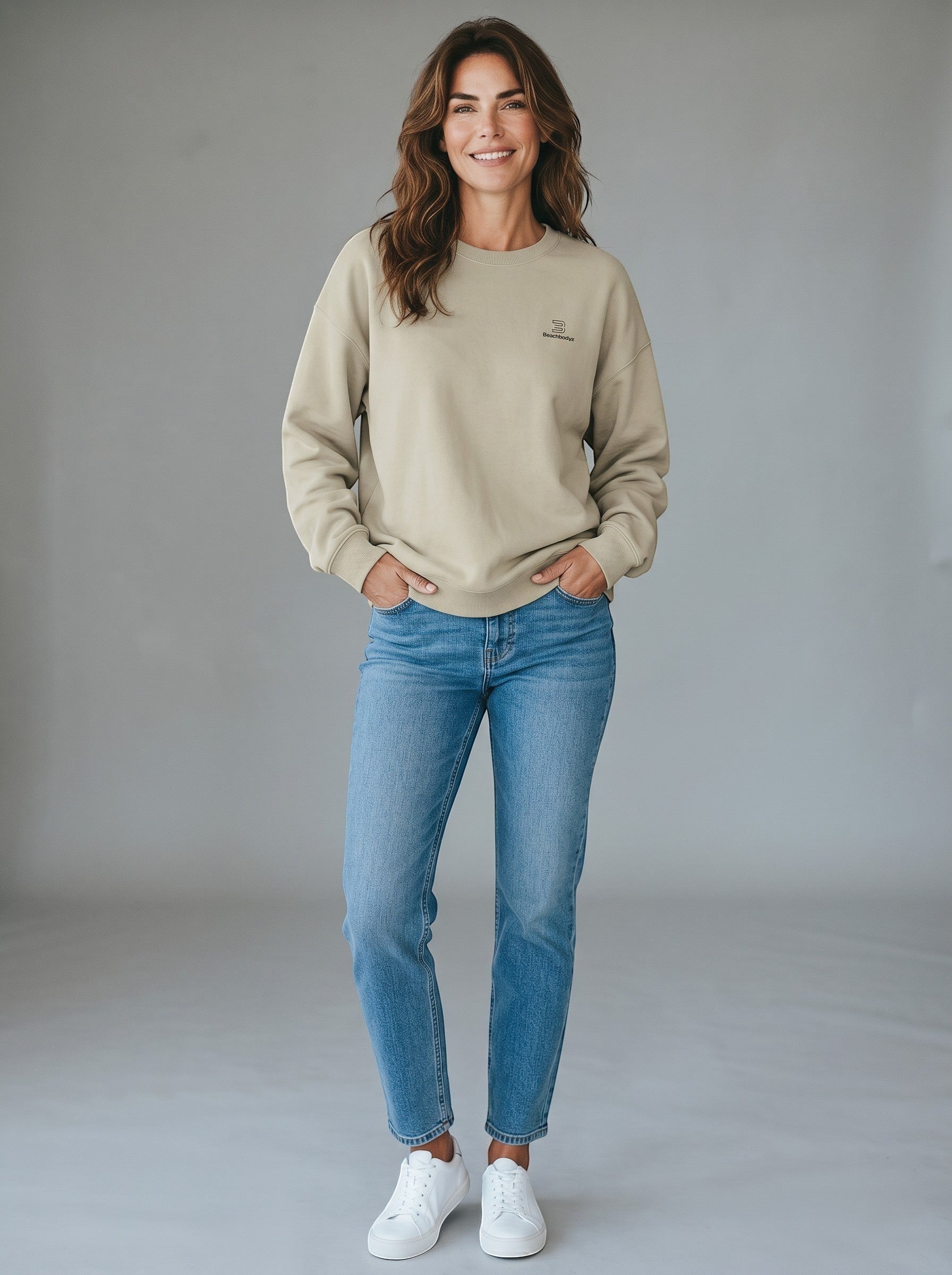 BeachBodyz® beige oversized sweatshirt with subtle embroidered logo on chest, made from organic cotton.