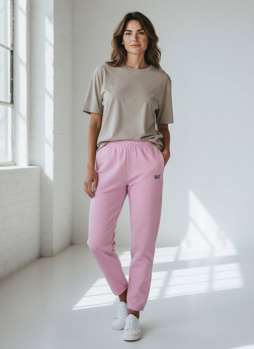 BeachBodyz® soft pink cotton blend jogging pants with elastic waistband, side pockets, and embroidered logo.