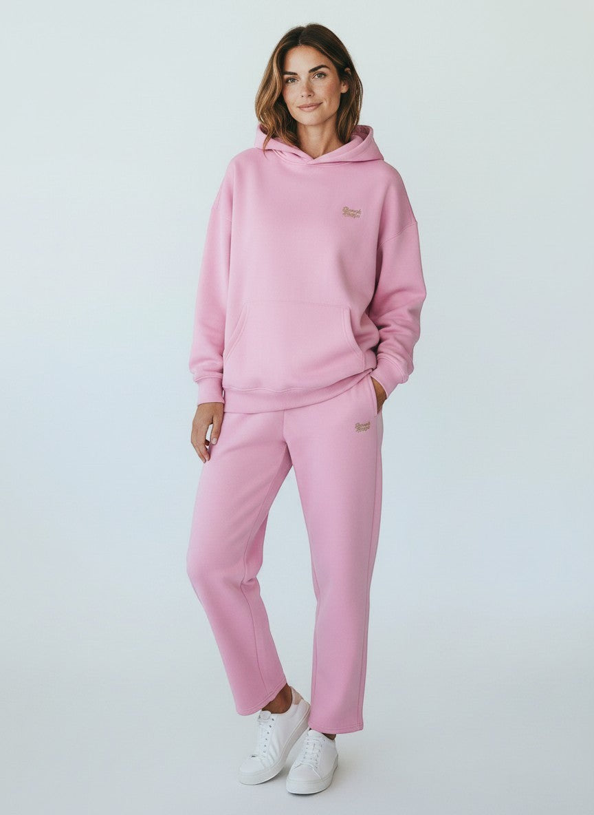 BeachBodyz® soft pink cotton-polyester blend jogginghose with embroidered logo and elastic waistband.