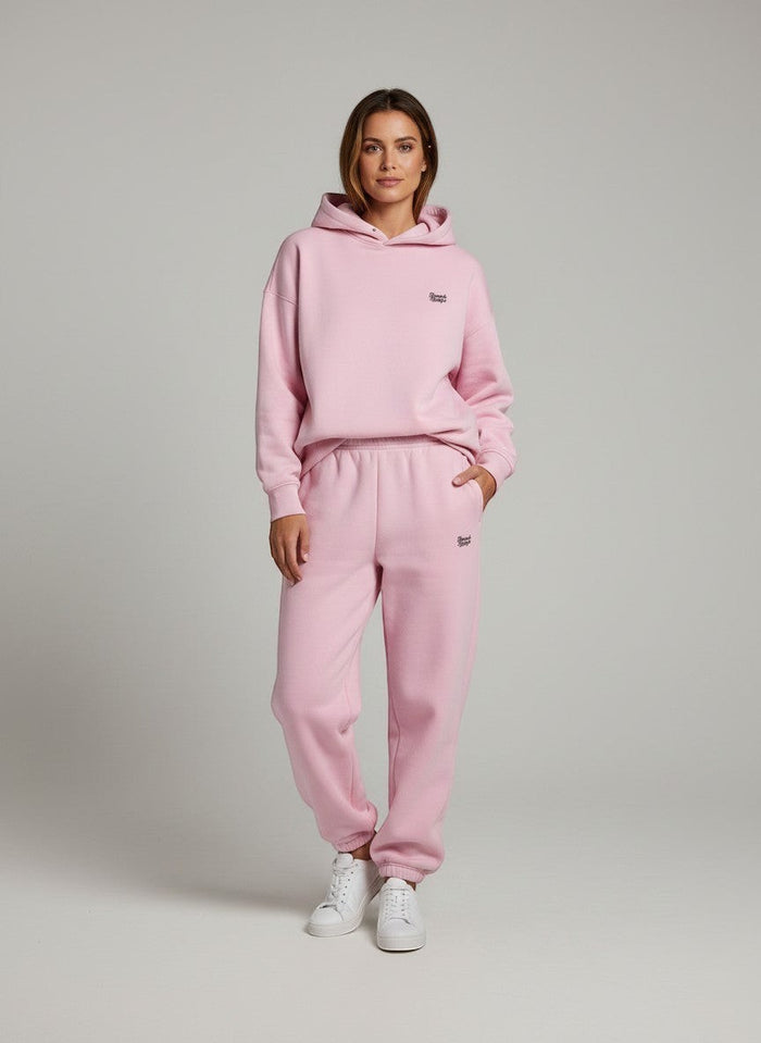 BeachBodyz® pink fluffy oversized jogging pants with embroidered logo and elastic waistband.