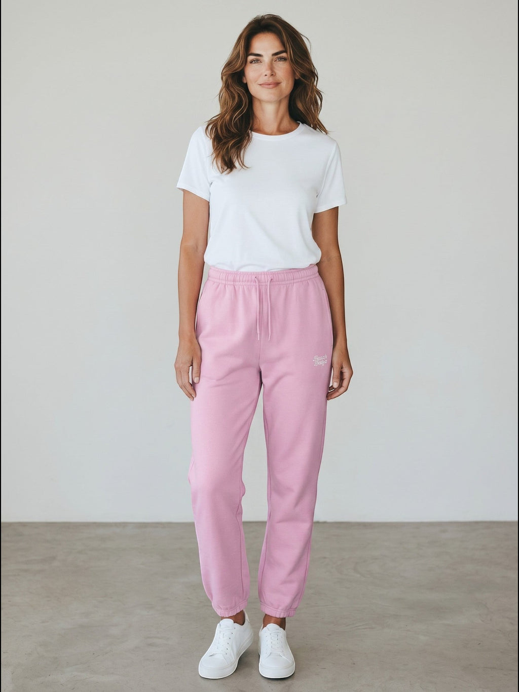 BeachBodyz soft pink fluffy cotton blend sweatpants with elastic waistband and cuffs, featuring subtle logo embroidery.