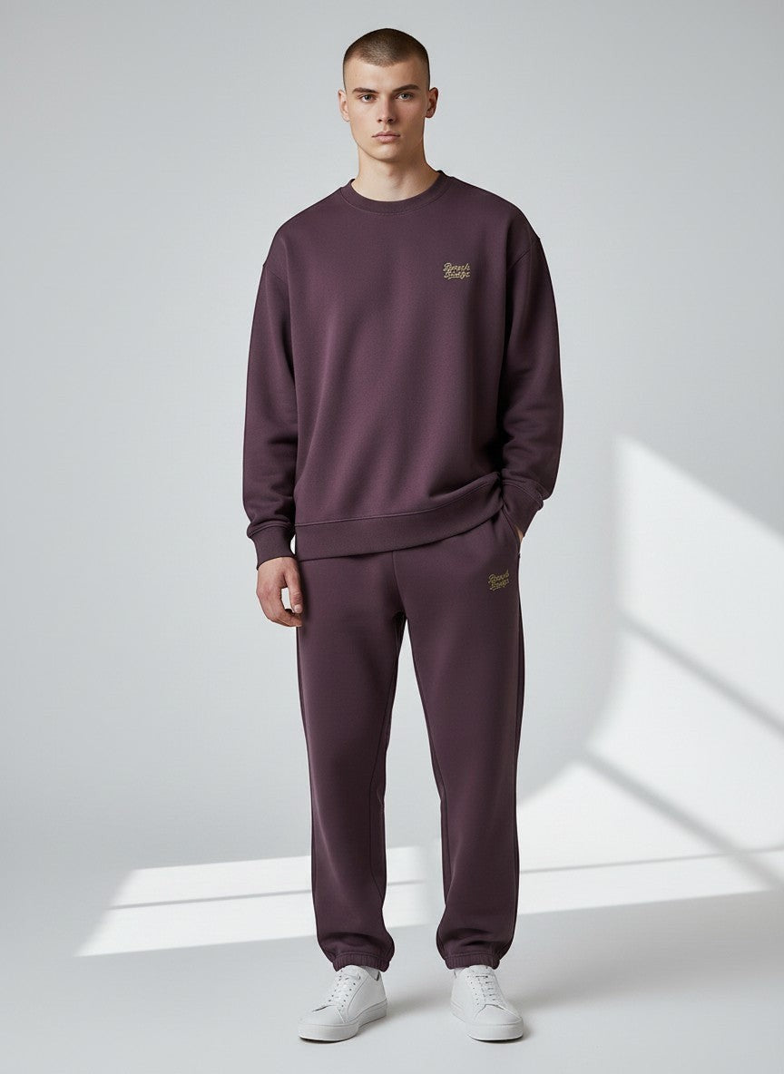 BeachBodyz® plum fluffy cotton-blend jogging pants with elastic waistband and embroidered logo.