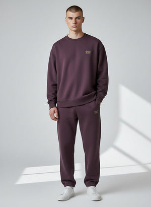 BeachBodyz® plum fluffy cotton-blend jogging pants with elastic waistband and embroidered logo.