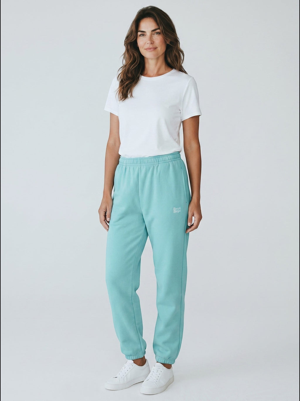 BeachBodyz® powder blue fluffy sweatpants with elastic waistband and cuffs, featuring subtle embroidered logo.