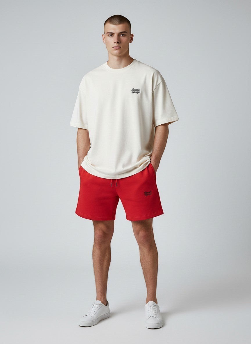 BeachBodyz® red cotton blend jogger shorts with embroidered logo and drawstring waist. Comfortable streetwear style.
