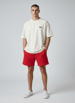 BeachBodyz® red cotton blend jogger shorts with embroidered logo and drawstring waist. Comfortable streetwear style.