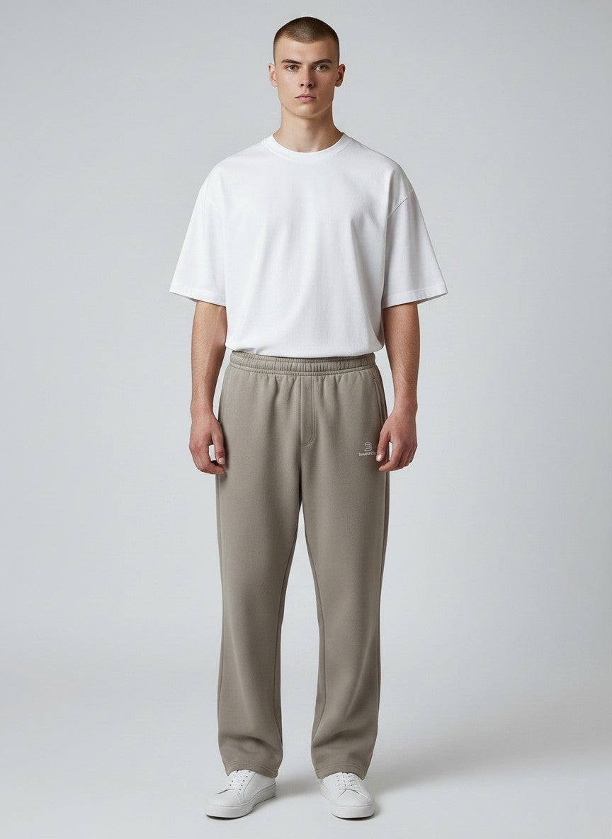 BeachBodyz® taupe cotton-blend jogging pants with elastic waistband and subtle logo embroidery.