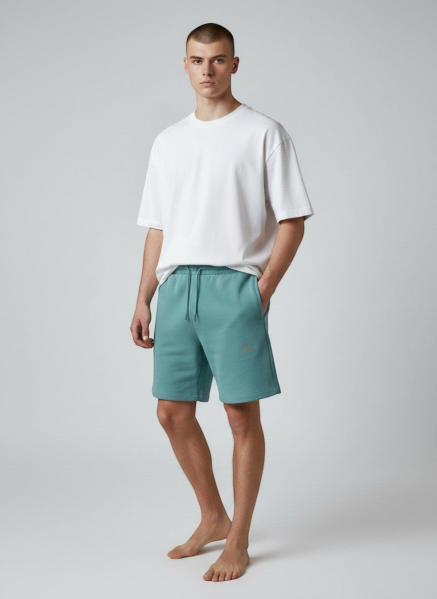 BeachBodyz® teal blue organic cotton jogger shorts with embroidered logo and drawstring waist.