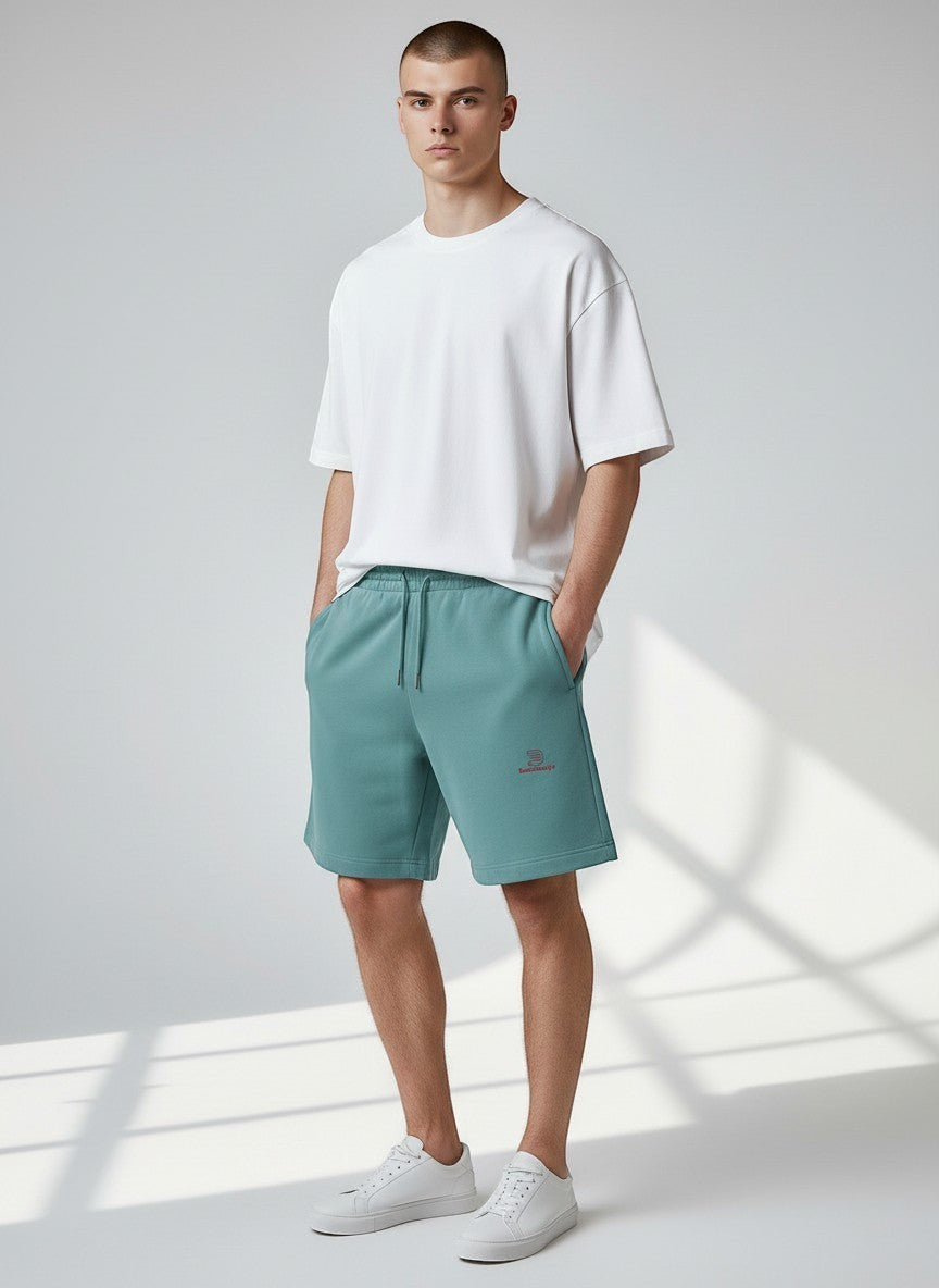 BeachBodyz® teal blue jogger shorts made from organic cotton with embroidered logo and drawstring waist.