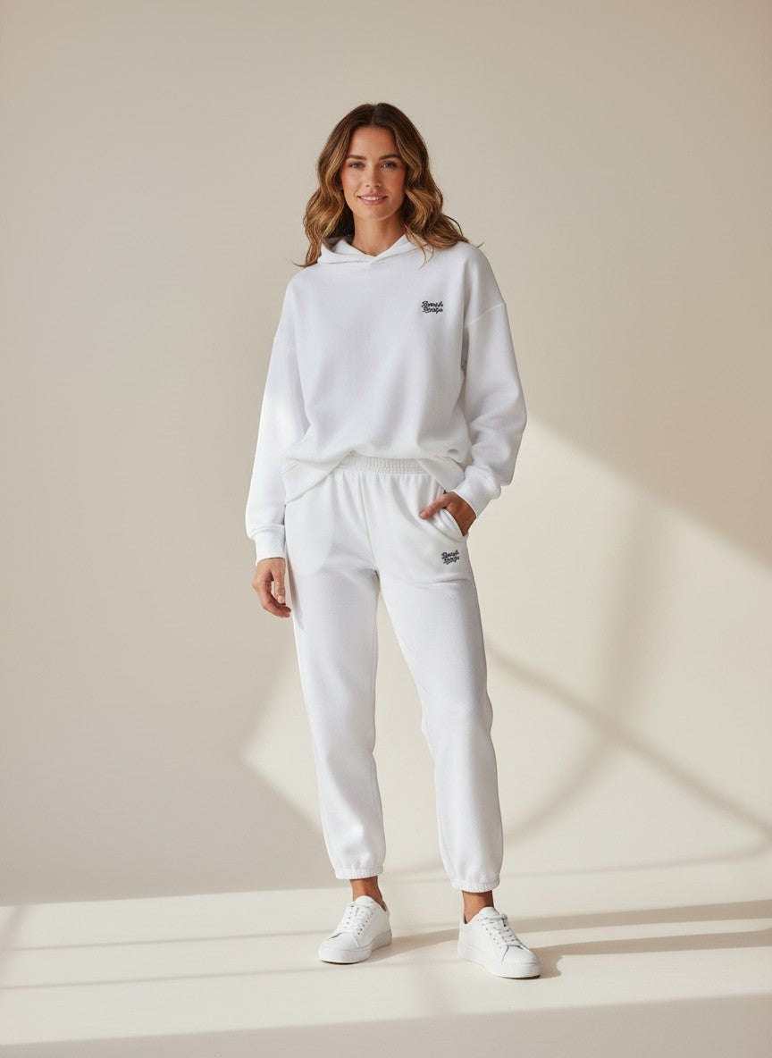 BeachBodyz® white cotton blend premium jogging pants with embroidered logo and elastic waistband.