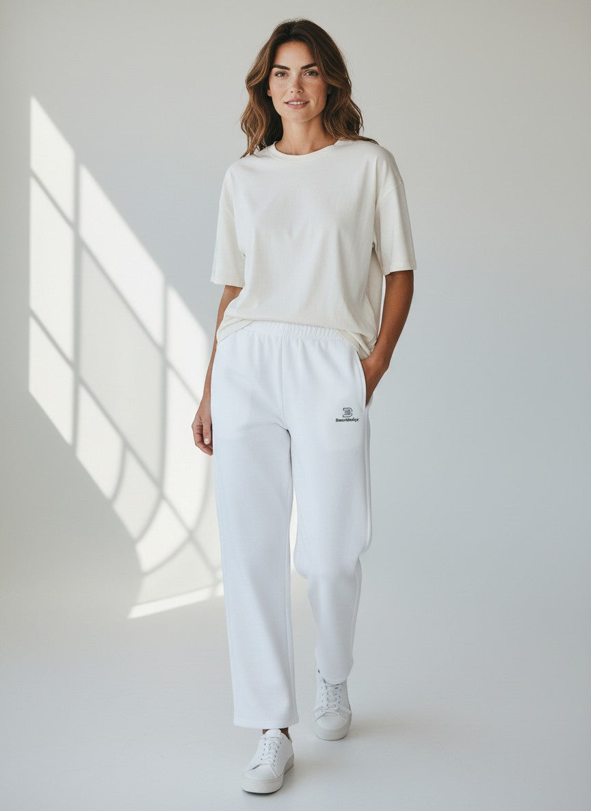 BeachBodyz® white cotton blend standard fit jogging pants with elastic waistband and subtle logo.