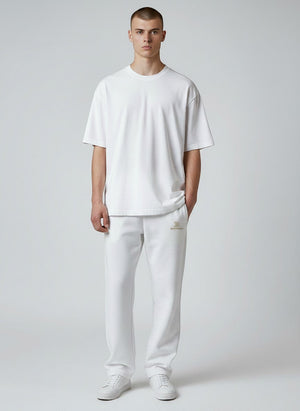 BeachBodyz® white cotton-blend jogging pants with elastic waistband and subtle logo.