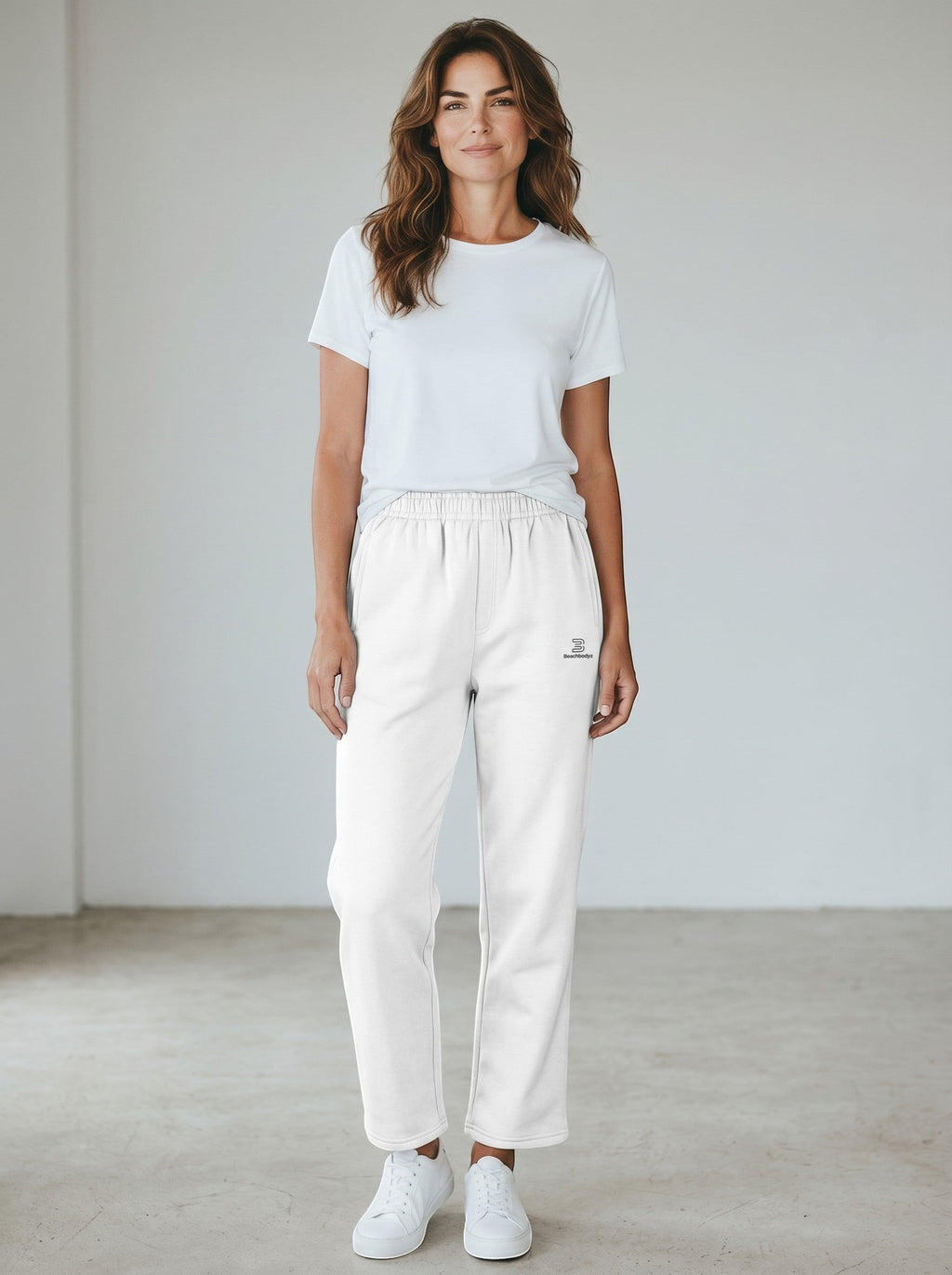BeachBodyz® white cotton blend standard fit jogginghose with elastic waistband and subtle logo.