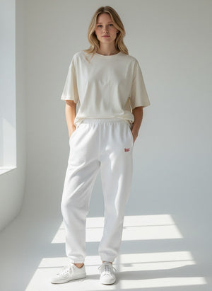 BeachBodyz® white fluffy cotton blend oversized jogging pants with embroidered logo and cuffed ankles.