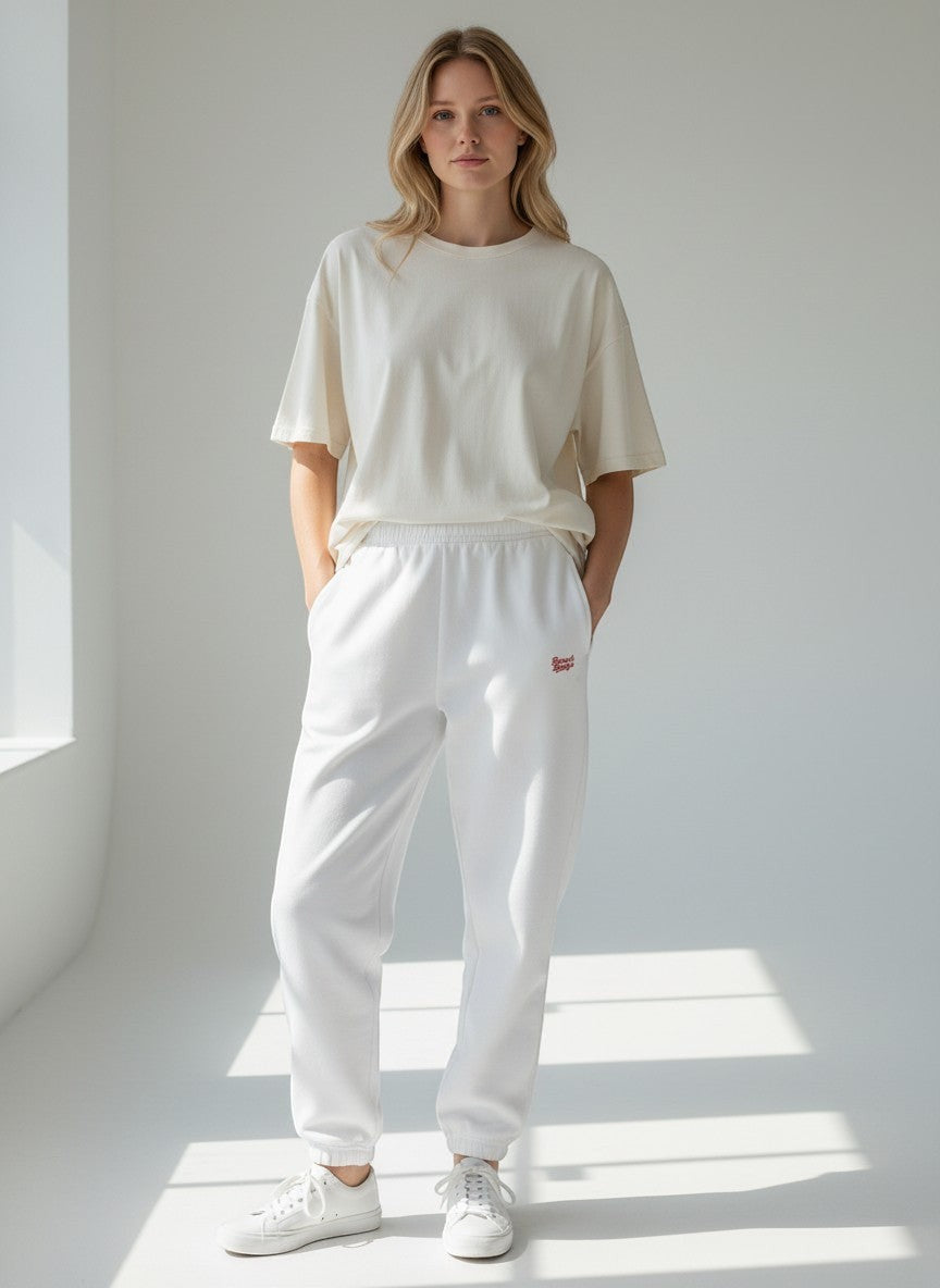 BeachBodyz® white fluffy cotton blend oversized jogging pants with embroidered logo and cuffed ankles.