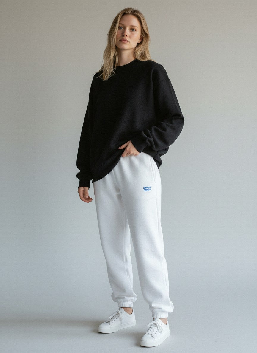 BeachBodyz® white fluffy cotton blend oversized jogging pants with blue logo detail.