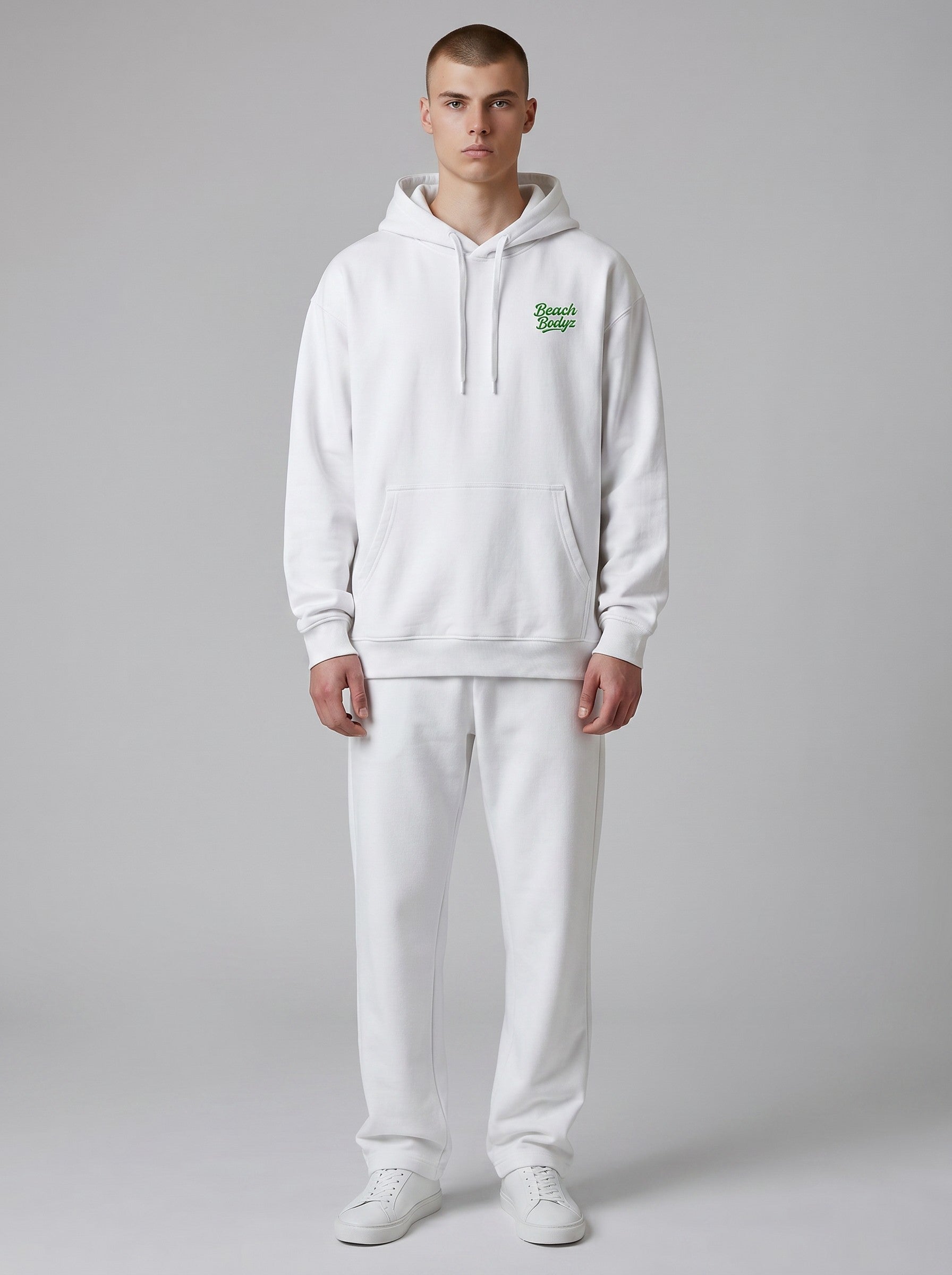 BeachBodyz® white oversized hoodie made from 400gsm bio-cotton with green embroidered logo on chest.