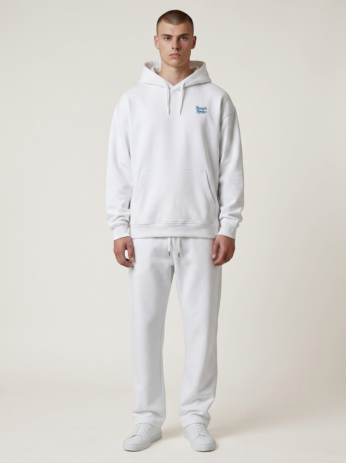 BeachBodyz® white oversized cotton hoodie with blue embroidered logo on chest and front pocket.