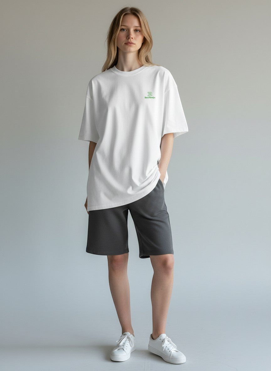 BeachBodyz® white oversized t-shirt made from organic cotton with a small green embroidered logo on the chest.