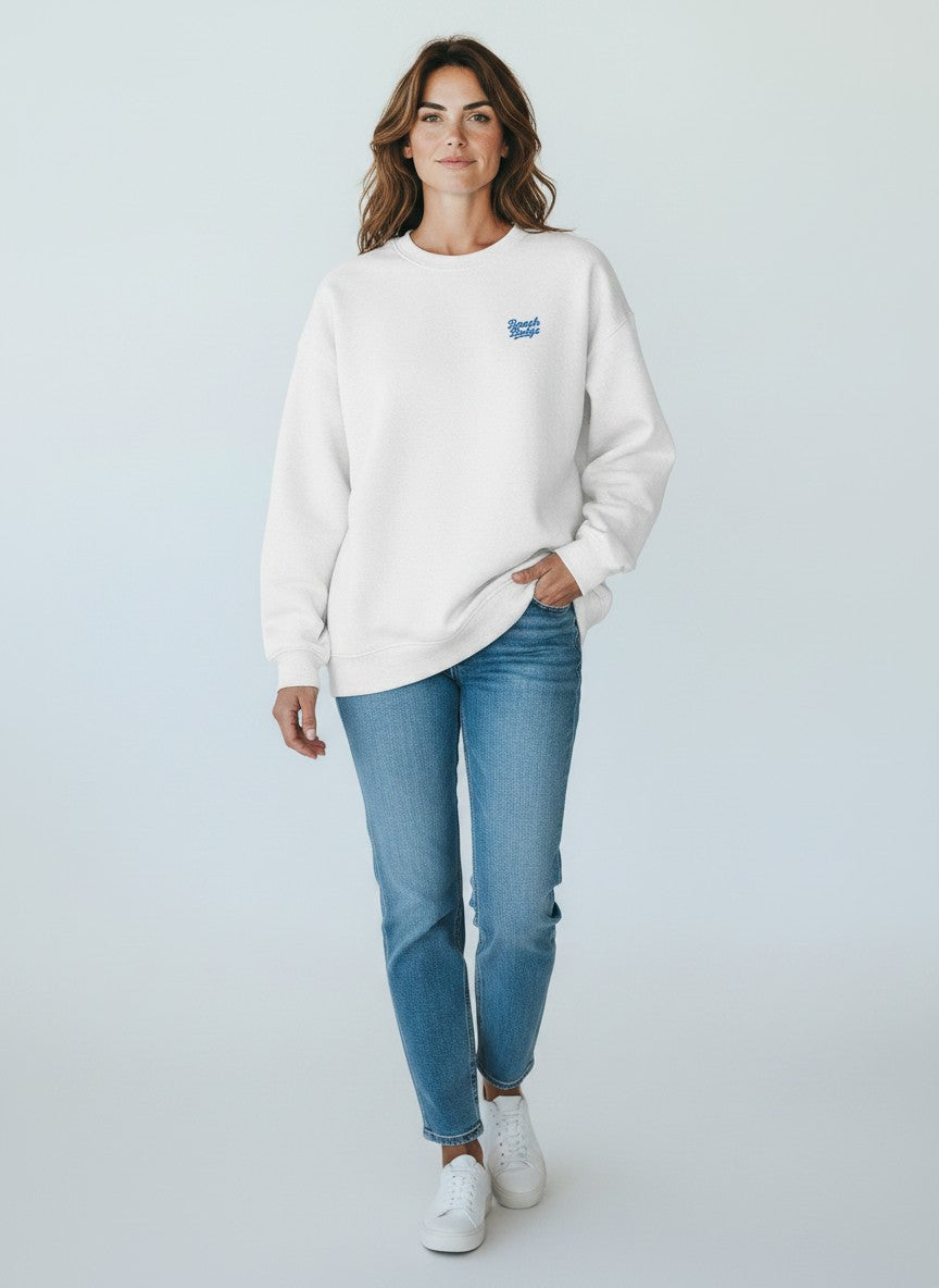 BeachBodyz® white oversized sweatshirt made from organic cotton with a small blue embroidered logo on the chest.